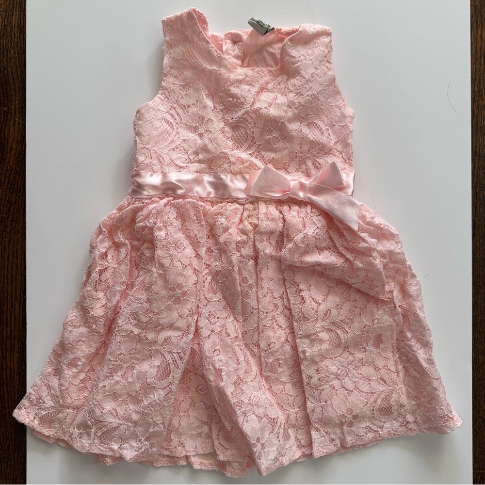 Pink dress with faux ribbon bow